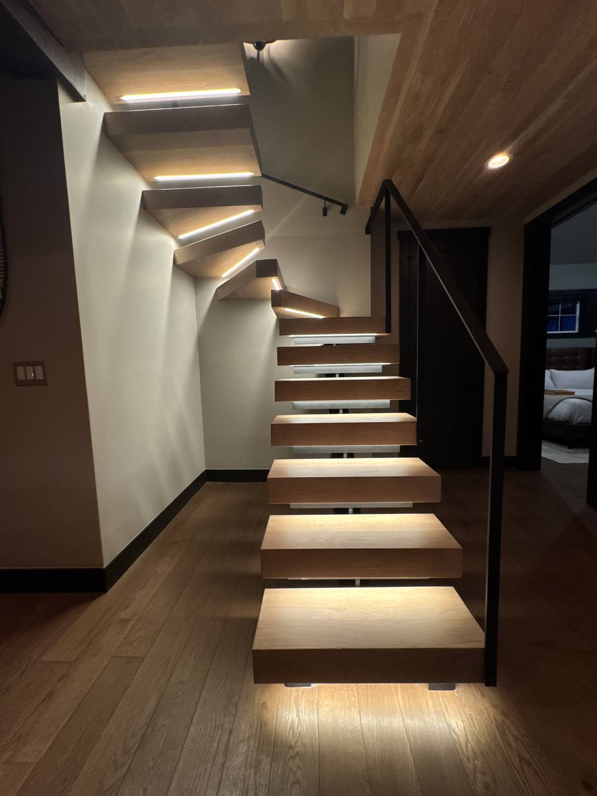Remodeled stairs with under-tread lighting