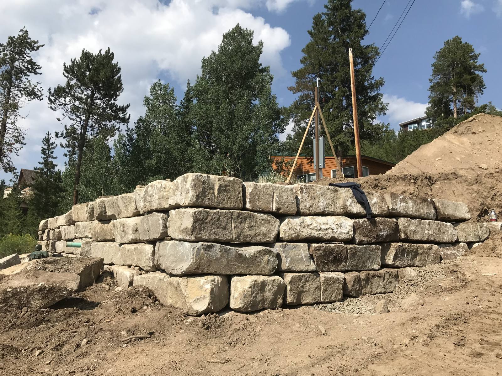 Retaining wall supporting the garage addition