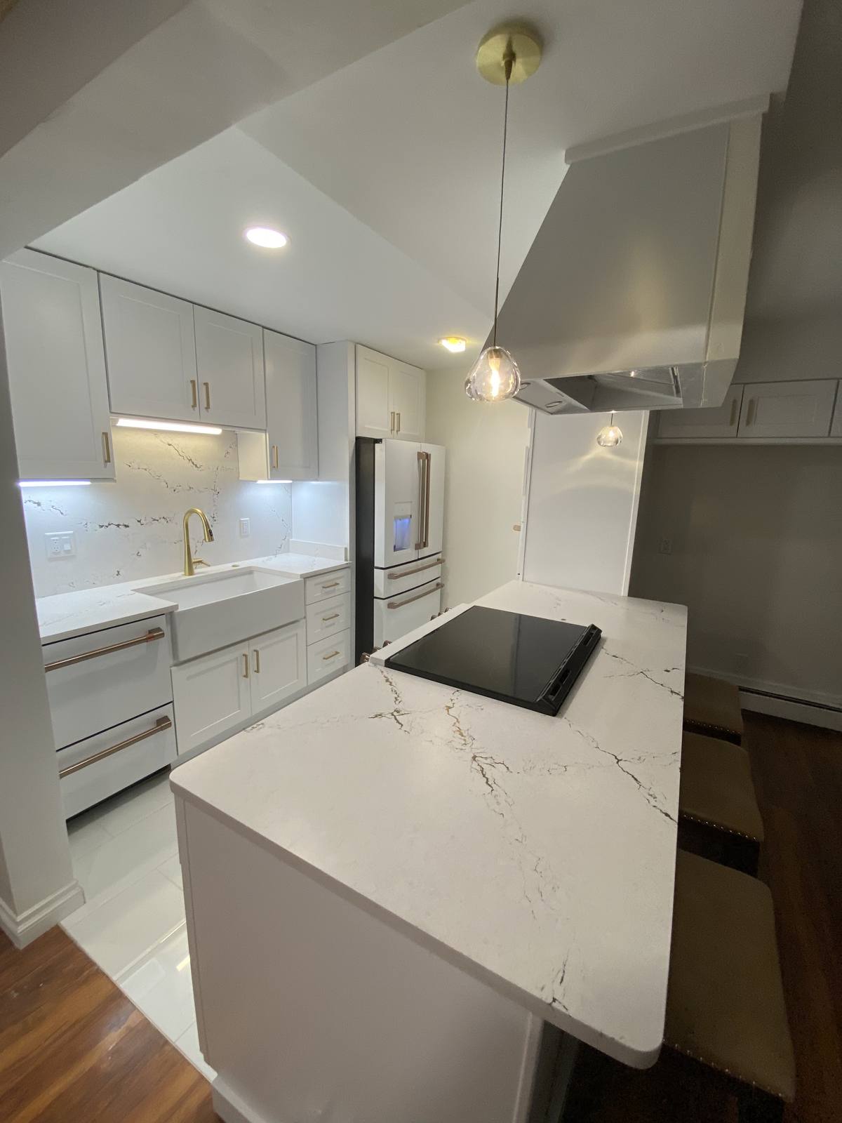 Custom kitchen with a statement range hood