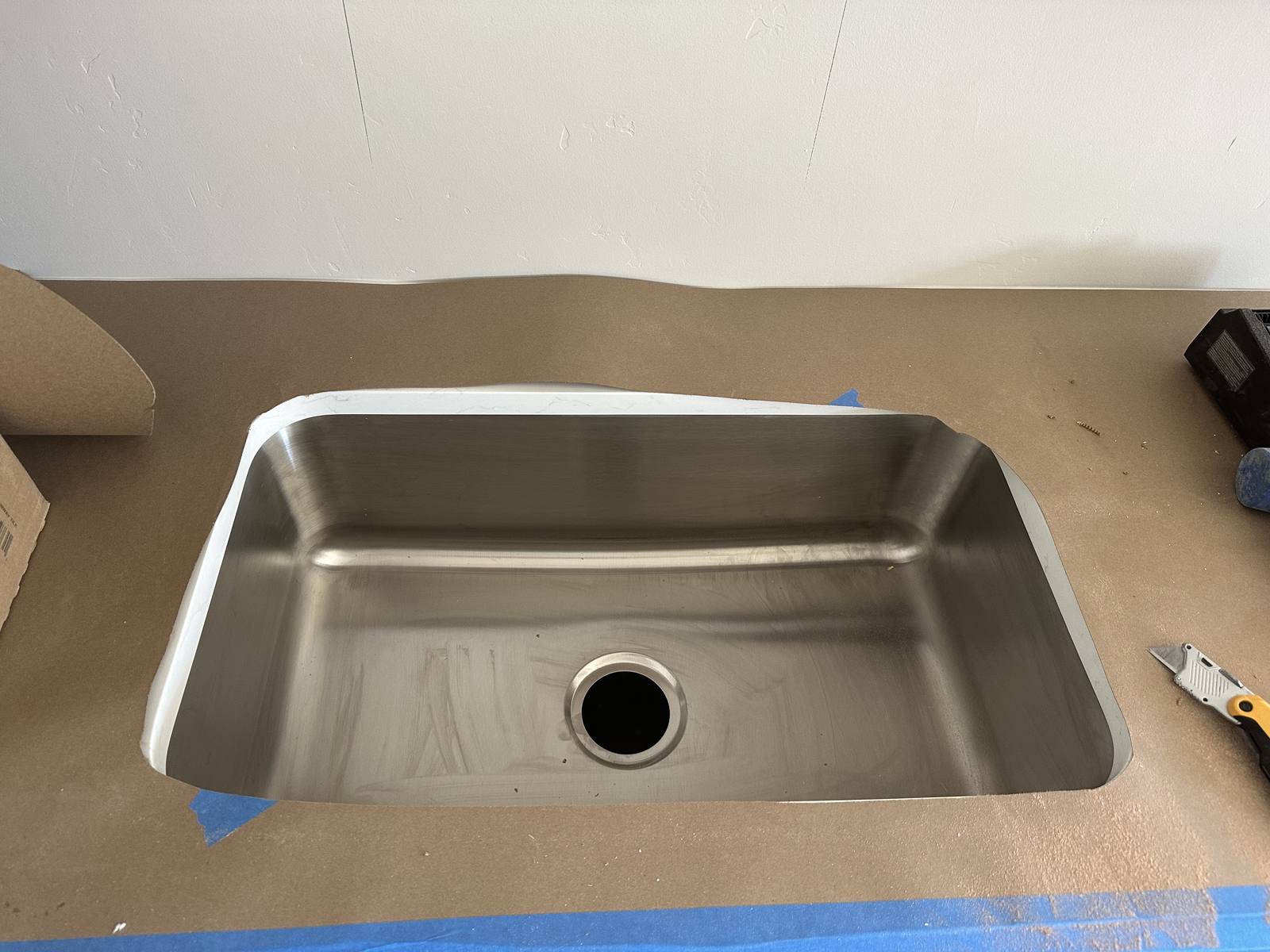 Kitchen sink installation in progress